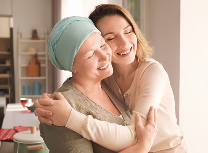 two ladies hugging